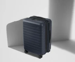 The Bigger Carry-On Flex in Navy Blue
